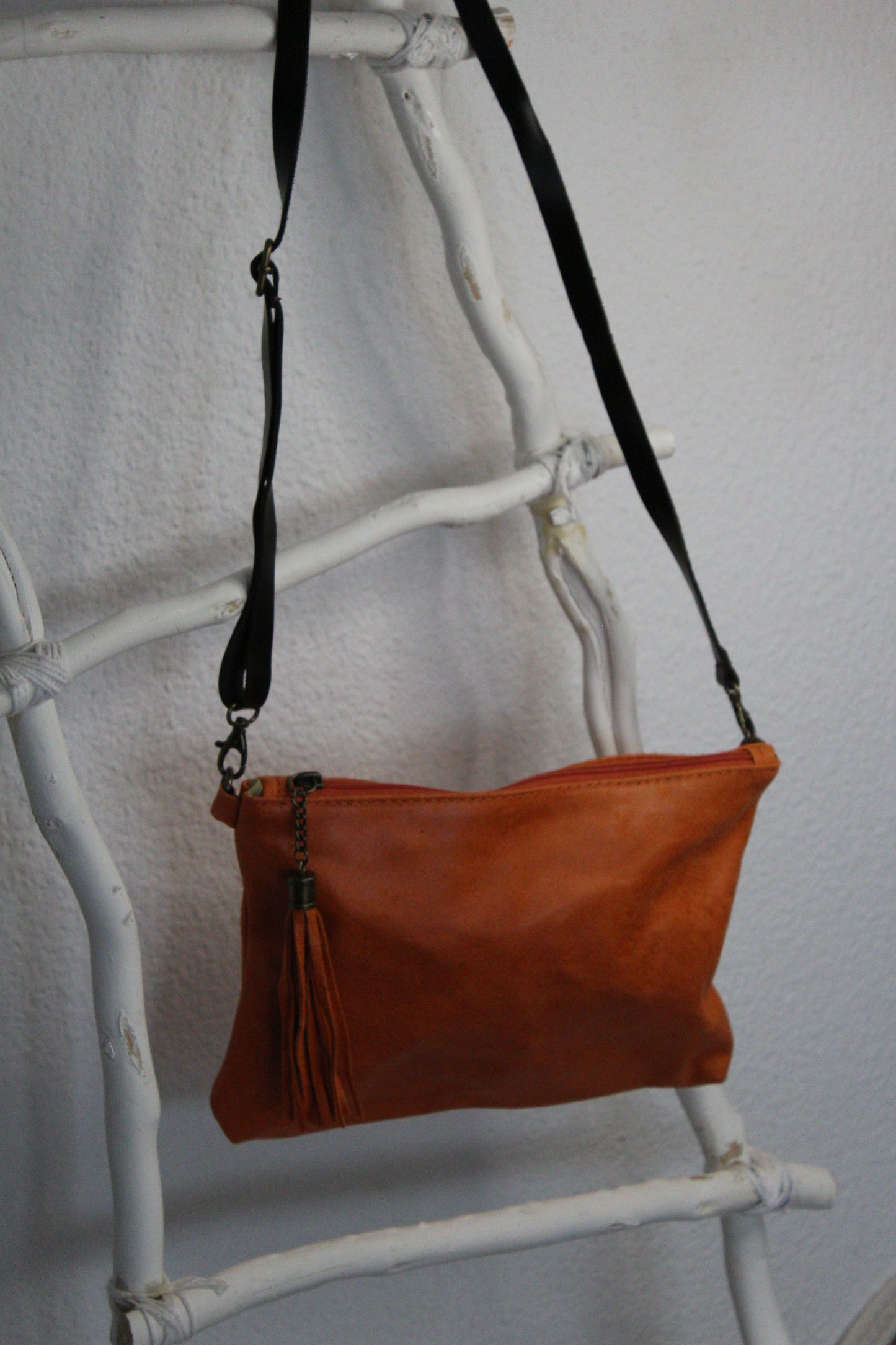 Bolso de mano y bandolera en color naranja de piel