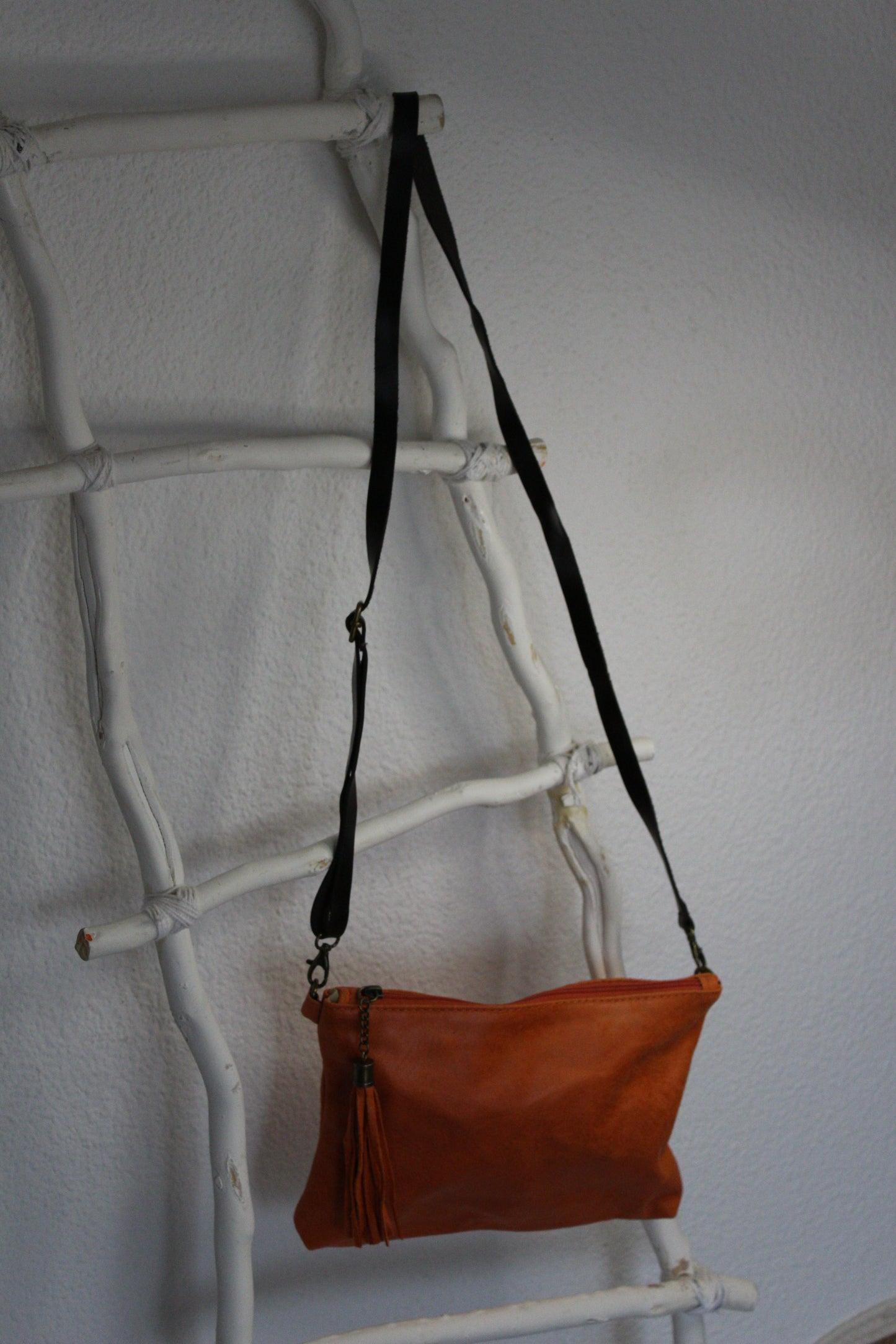 Bolso de mano y bandolera en color naranja de piel